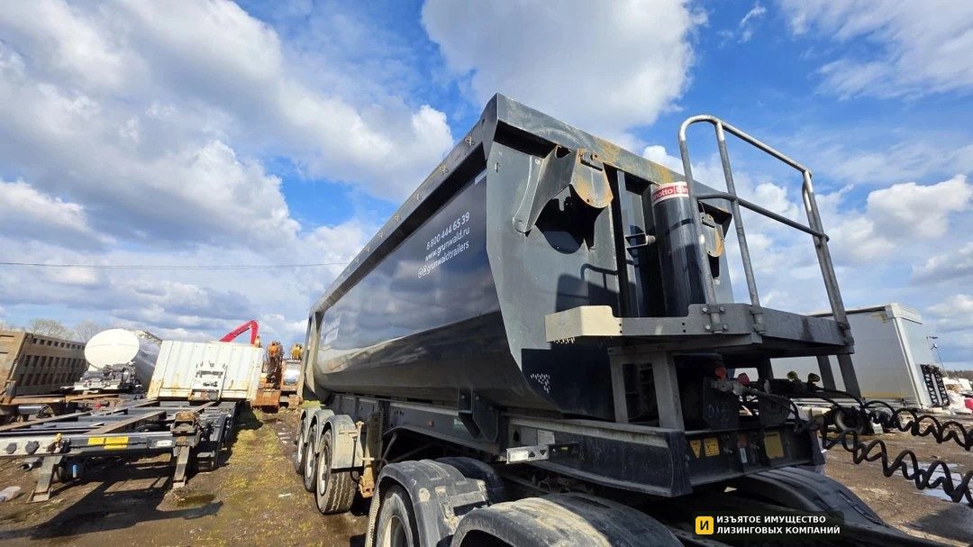 Полуприцеп самосвальный GRUNWALD 9453